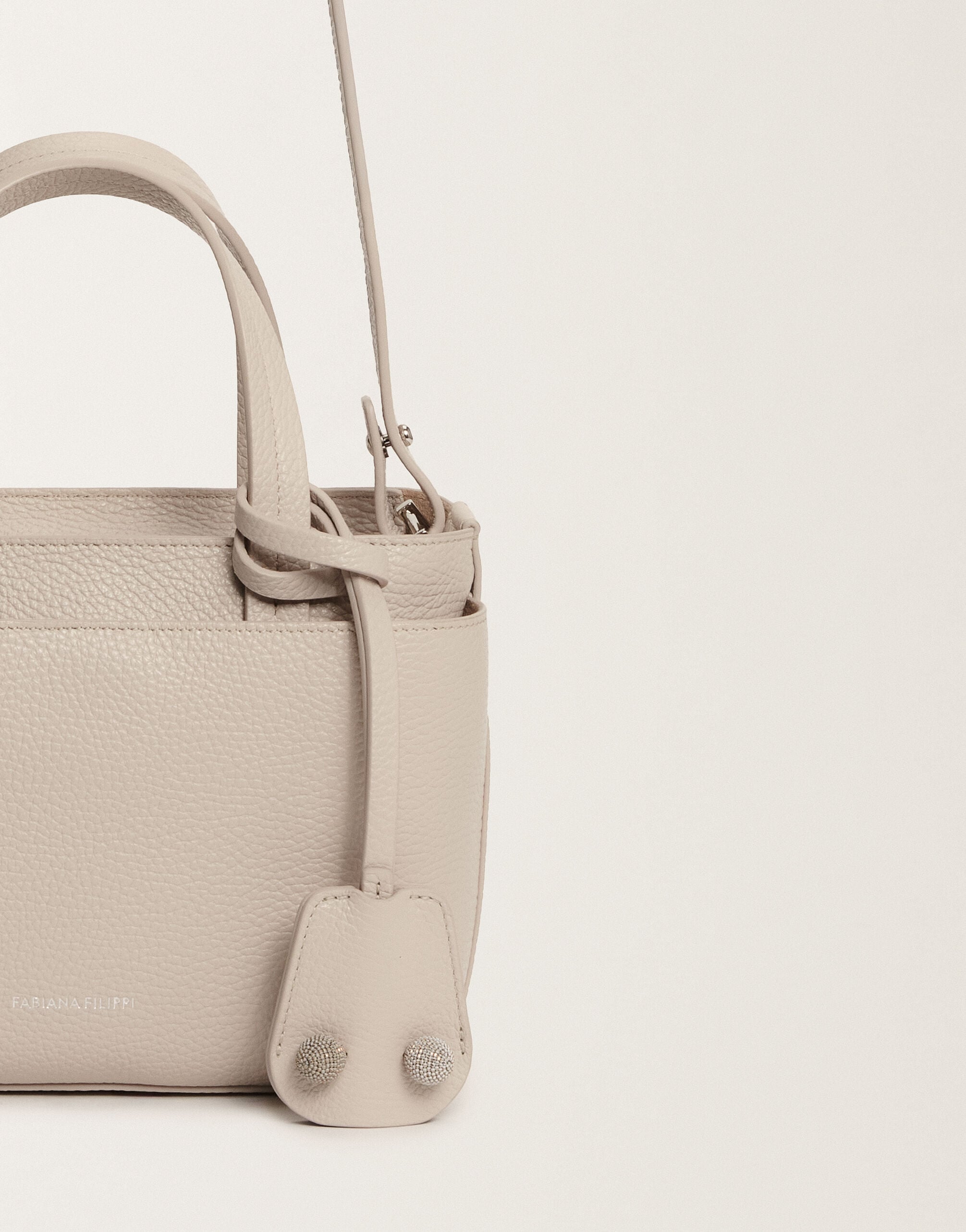 レディースMedium grained leather handbag, marble ハンドバッグ