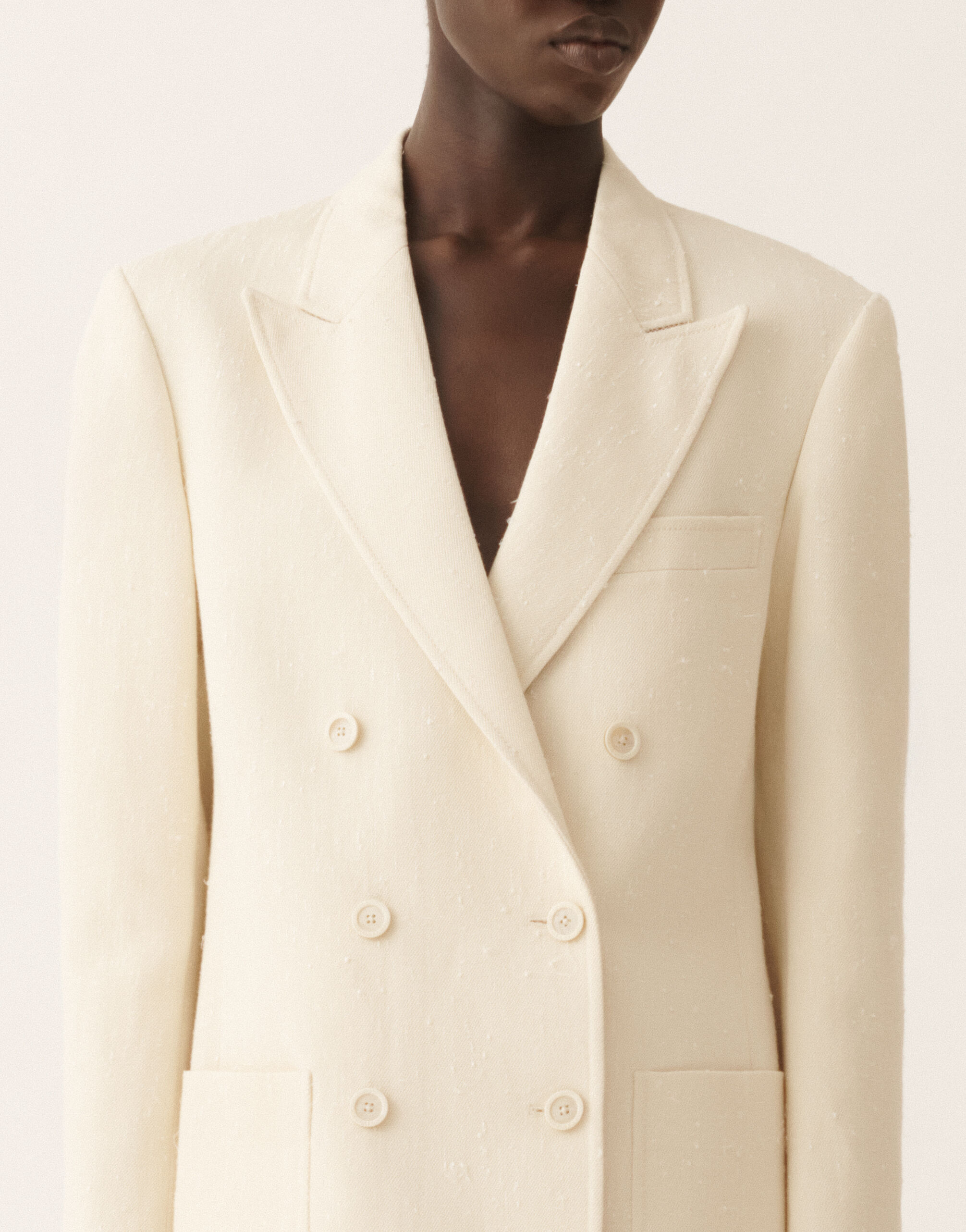 Double-breasted jacket in butter-colored fil coupé tailoring drop